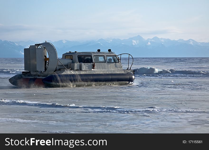 The Hovercraft On Background Of The Mountains.