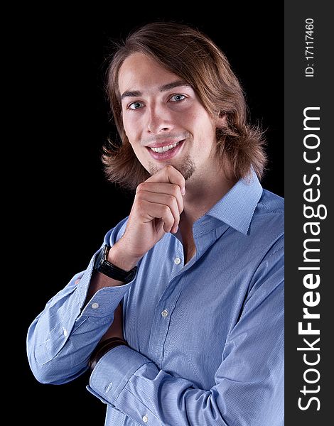 Young fresh business man with long hair - European. Young fresh business man with long hair - European.