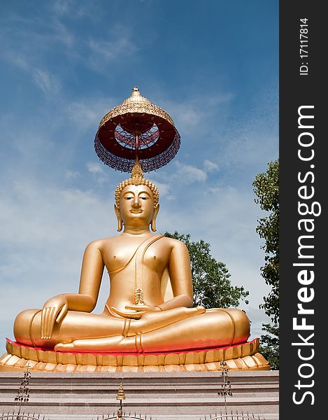 Golden Buddha Statue With Blue Sky