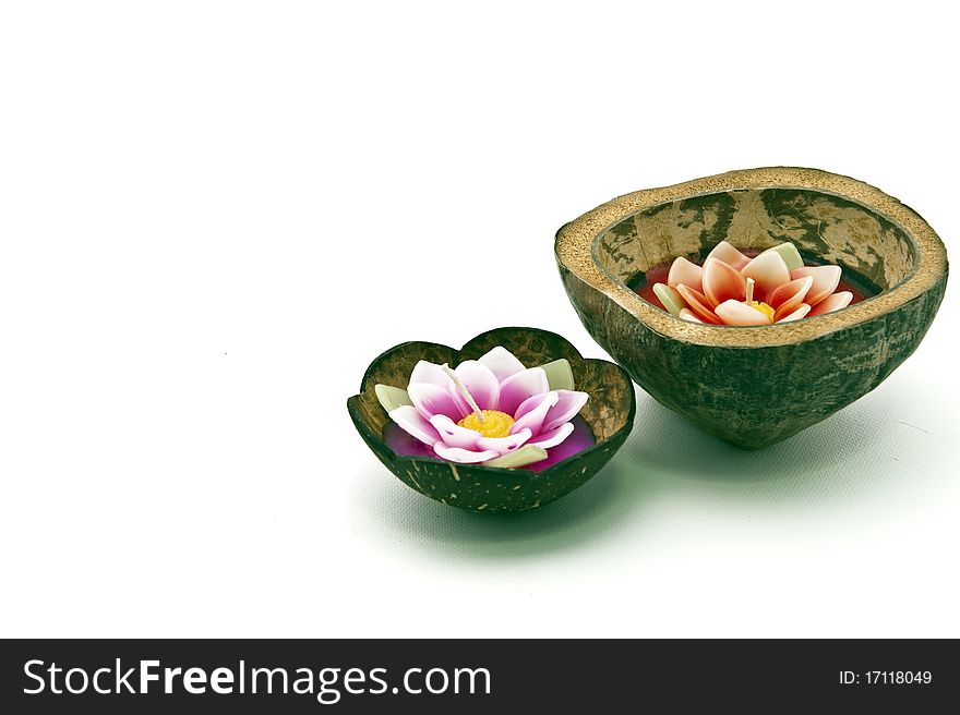 Floating candle in coconut shell with bamboo glass and fresh egg basket