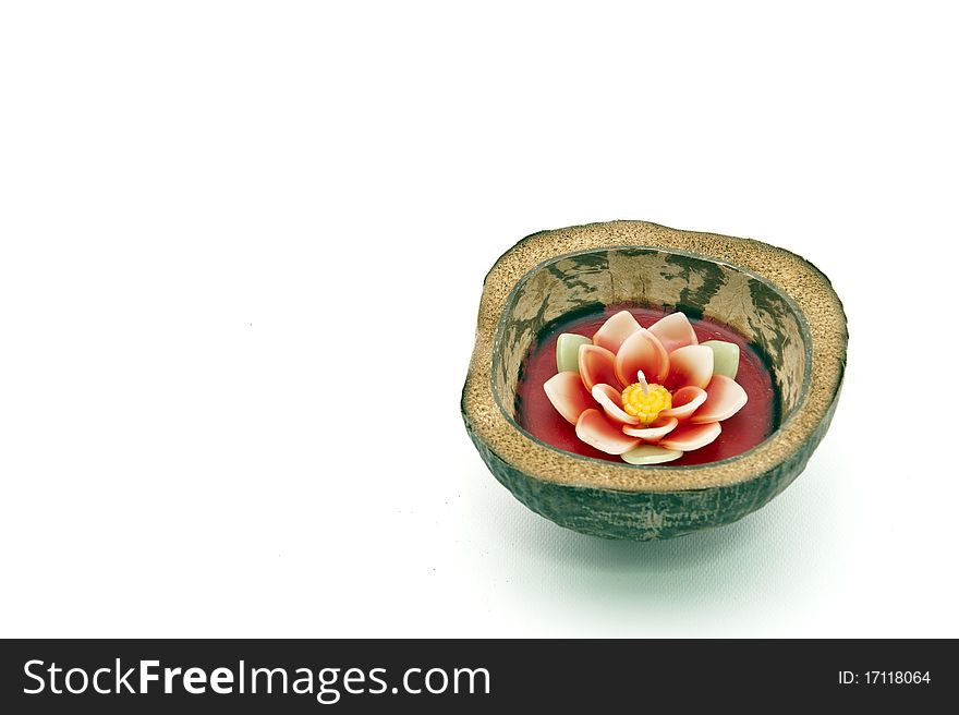 Floating candle in coconut shell with bamboo glass and fresh egg basket