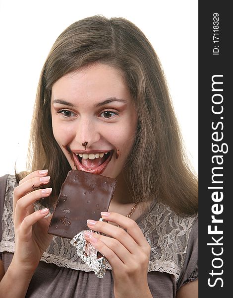 Young attractive woman eat chocolate
