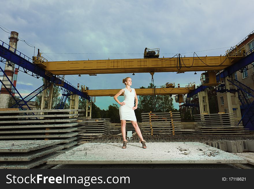 Businesswoman Posing Over Old Factory