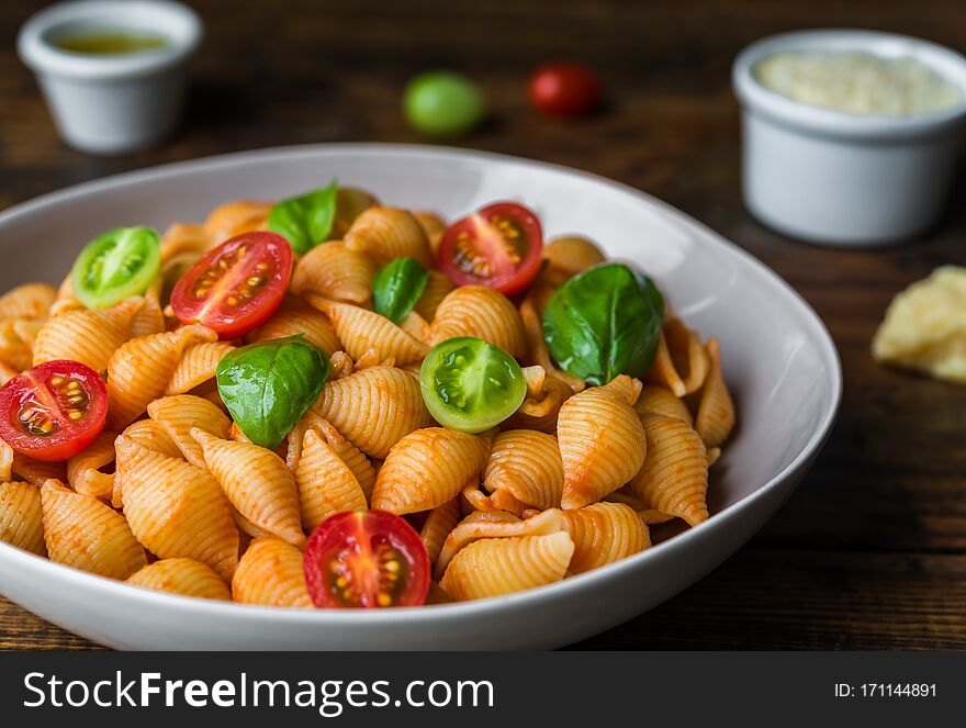 Conchiglie Abissine Rigate Pasta With Tomato Sauce, Cherry Tomatoes, And Basil