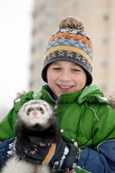 The Boy Holds A Polecat Stock Image The Boy Holds A Polecat Stock Image