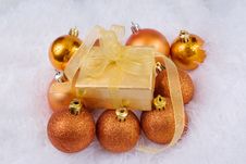Christmas Spheres And Golden Box Stock Photo