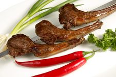 Shish Kebab With Parsley, Paprika And Onion On Whi Royalty Free Stock Images