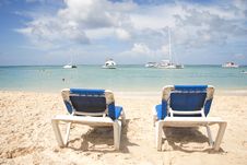 Blue Chairs Overlooking Tropical Ocean Royalty Free Stock Photo