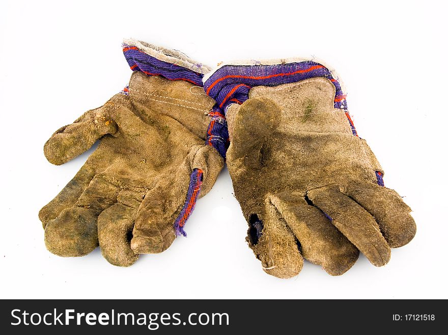 Old work gloves isolated on white