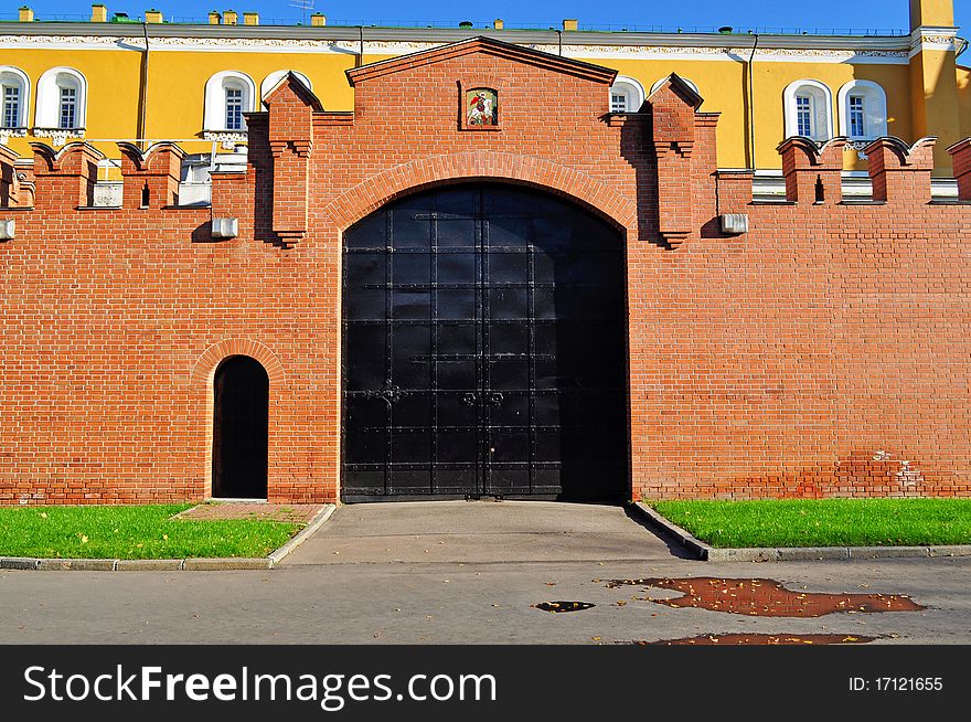 Gates in the walls of the Kremlin's black iron autumn day. Gates in the walls of the Kremlin's black iron autumn day
