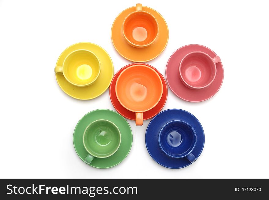 Colored coffee cups and dishes