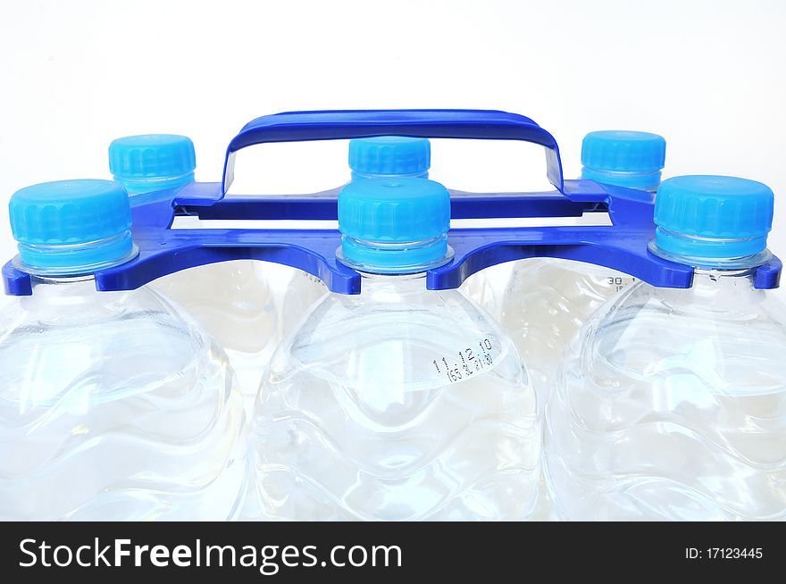 Close up of water bottles over white background