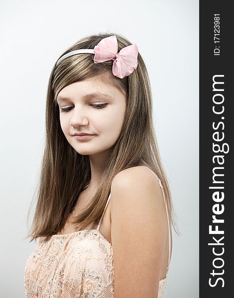 Fashion portrait of lovely young teenage girl indoors