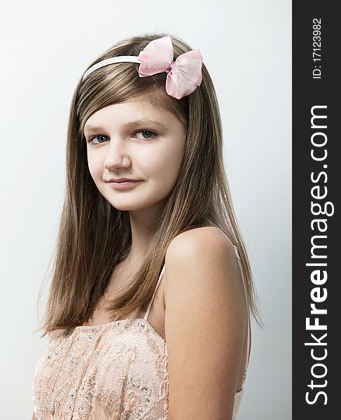 Fashion portrait of lovely young teenage girl indoors