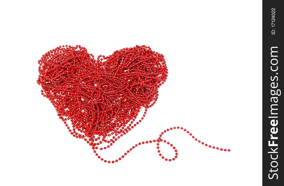 Red heart with beads. Isolated on white background.