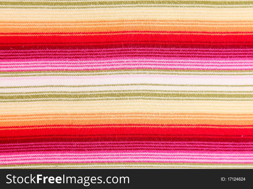 Textile background with lines of various colors