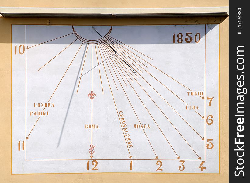 Sundial in the square in the village of Camogli