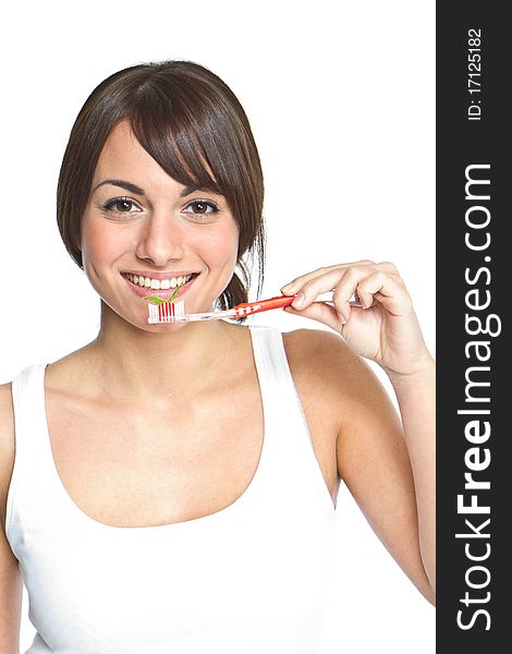 Young happy woman brushing teeth