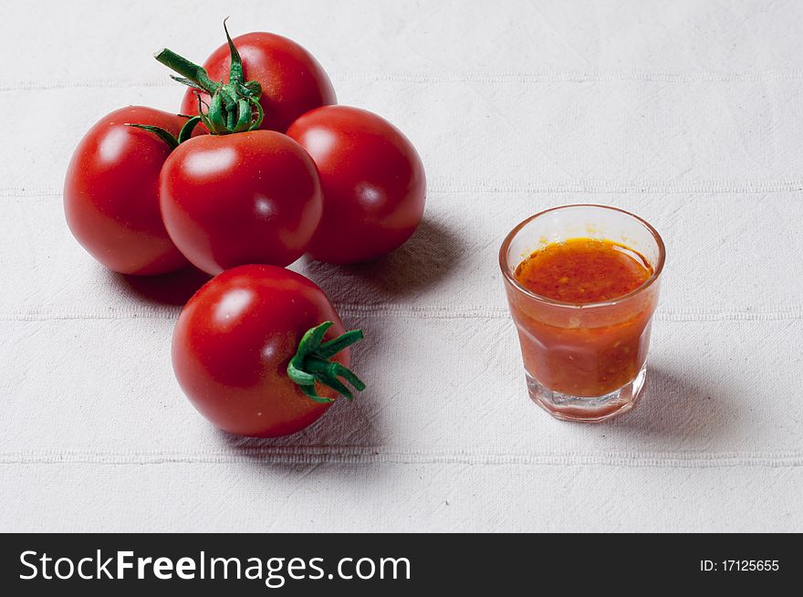 Fresh red tomatos and sauce