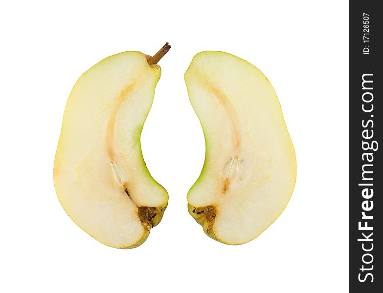Ripe pear cut into two parts. Isolated on white background