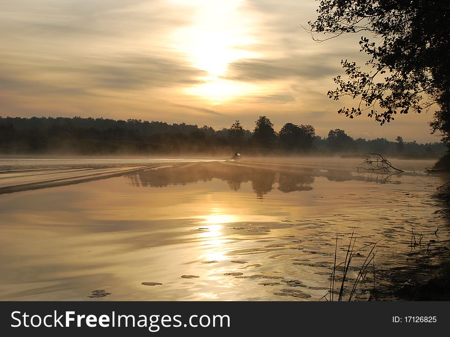 Decline on the river. A floating motor boat