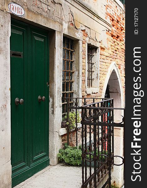 View of the old green door (Mediterranean architecture). View of the old green door (Mediterranean architecture)
