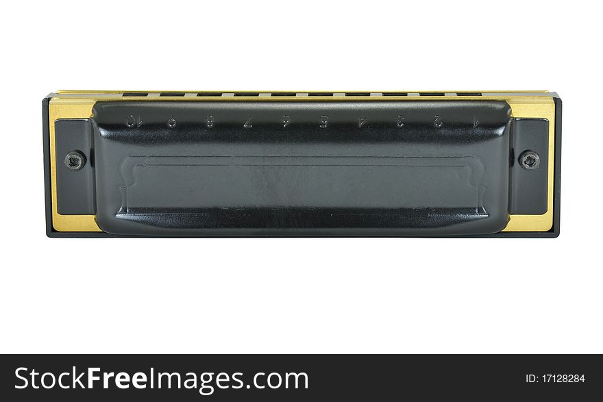 A black and brass blues harp isolated on a white background. The Blues harp is used in Blues music and sometimes in Country music. A black and brass blues harp isolated on a white background. The Blues harp is used in Blues music and sometimes in Country music.
