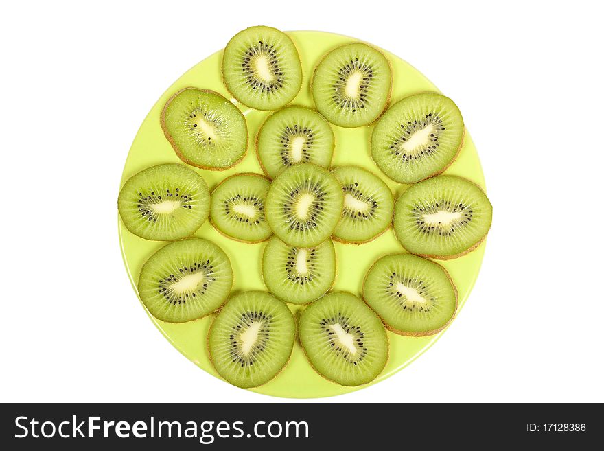 Five Kiwi Slices on Plate isolated on white background