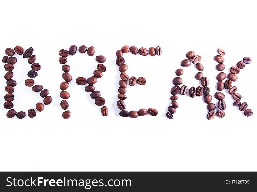 Break written with coffee beans on white background. Break written with coffee beans on white background.