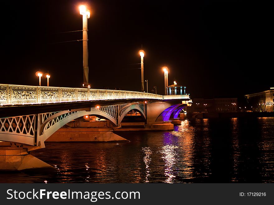 Night bridge in St. Petersburg city with illumination