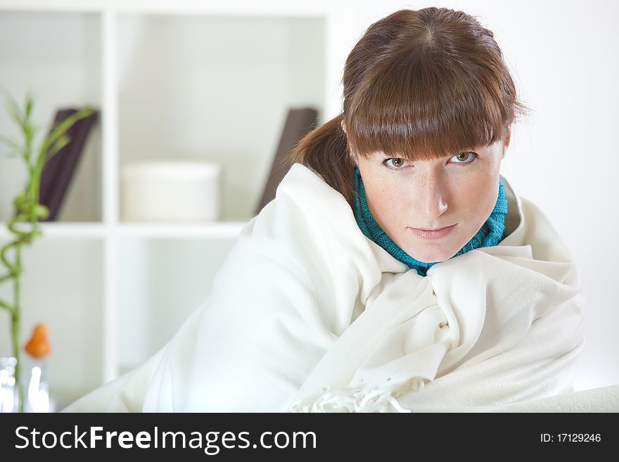 Woman Covering With Rug On Sofa