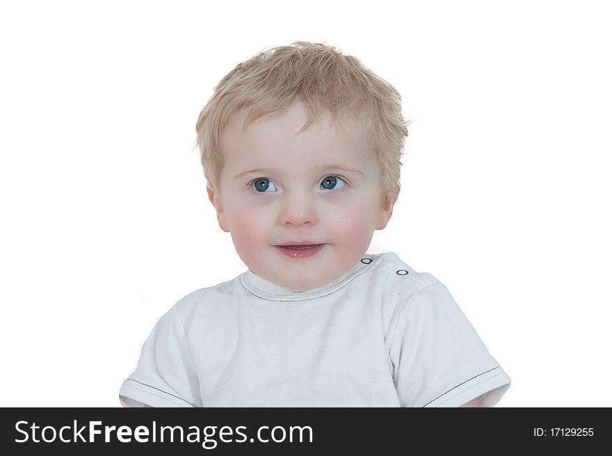 Cute young boy looking up on white background