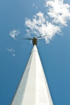 Spinning Windmill With Blue Sky And Clouds Royalty Free Stock Image