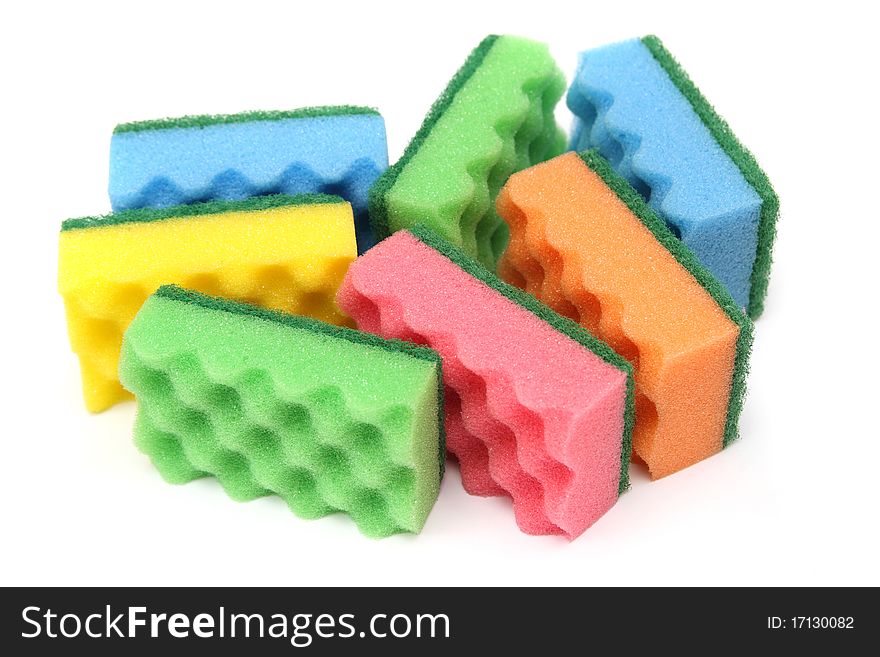 Group of multi-colored sponges for home care - isolated on white