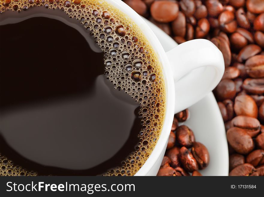 Black coffee beans on white background