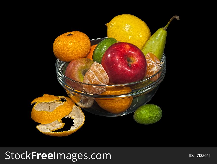 Still life with fruit in a clear bowl. Still life with fruit in a clear bowl