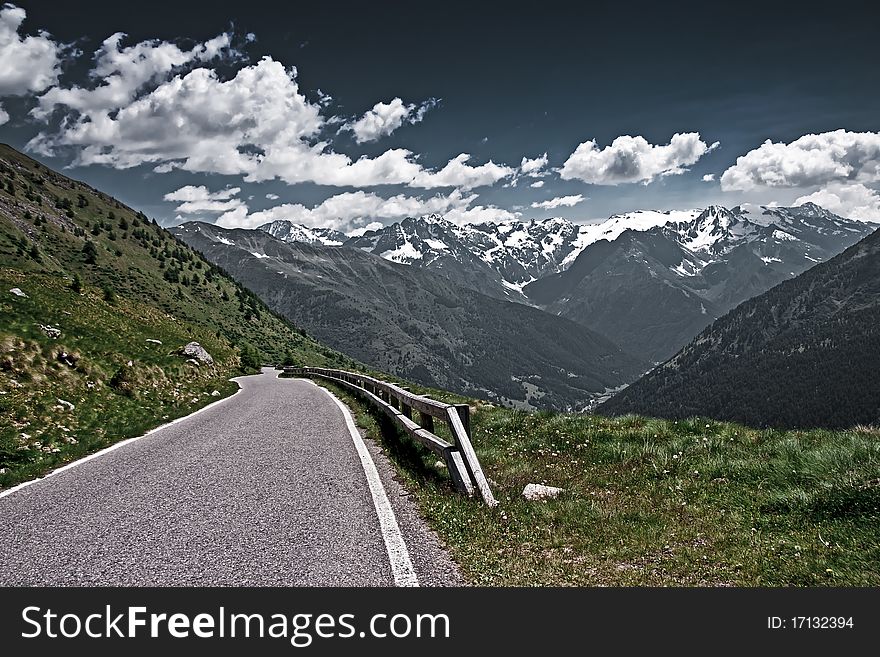 The Gavia Pass in Italy. Empty road vista in the Italian Alps.