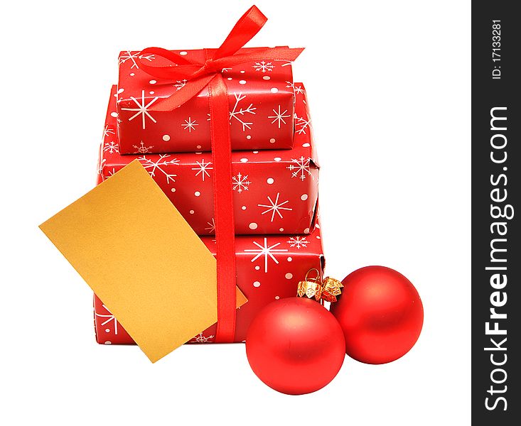 Gift boxes with red balls and card for greeting. Gift boxes with red balls and card for greeting