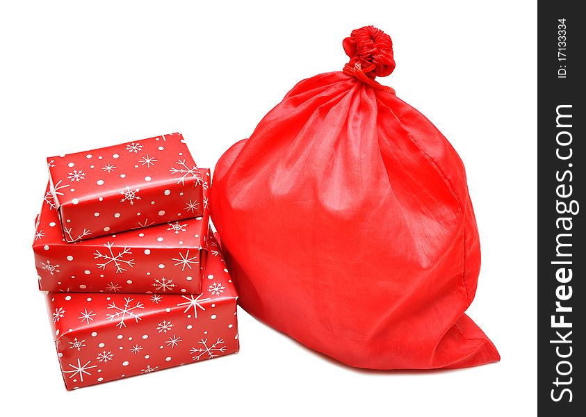 Christmas gift box and red bag on white on white. Christmas gift box and red bag on white on white