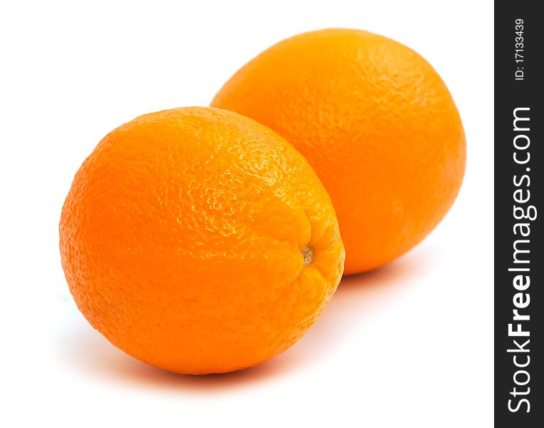Two oranges isolated on white background