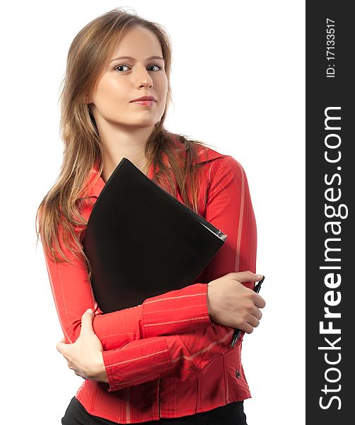 Confident businesswoman standing and holding folder and pen