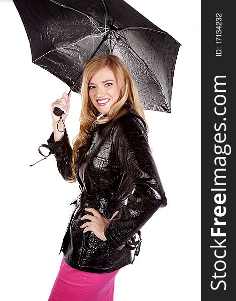 A woman holding her umbrella happy that she is dry. A woman holding her umbrella happy that she is dry.