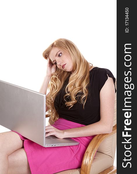 A woman taking a break from her laptop after working for so long. A woman taking a break from her laptop after working for so long.