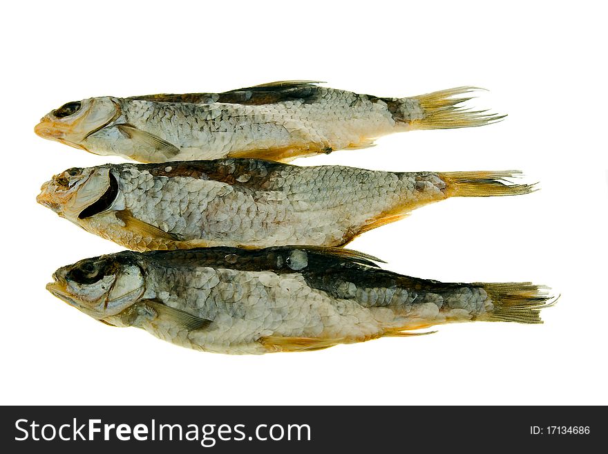 Three salted and dried big fishes (on a white background). Three salted and dried big fishes (on a white background)