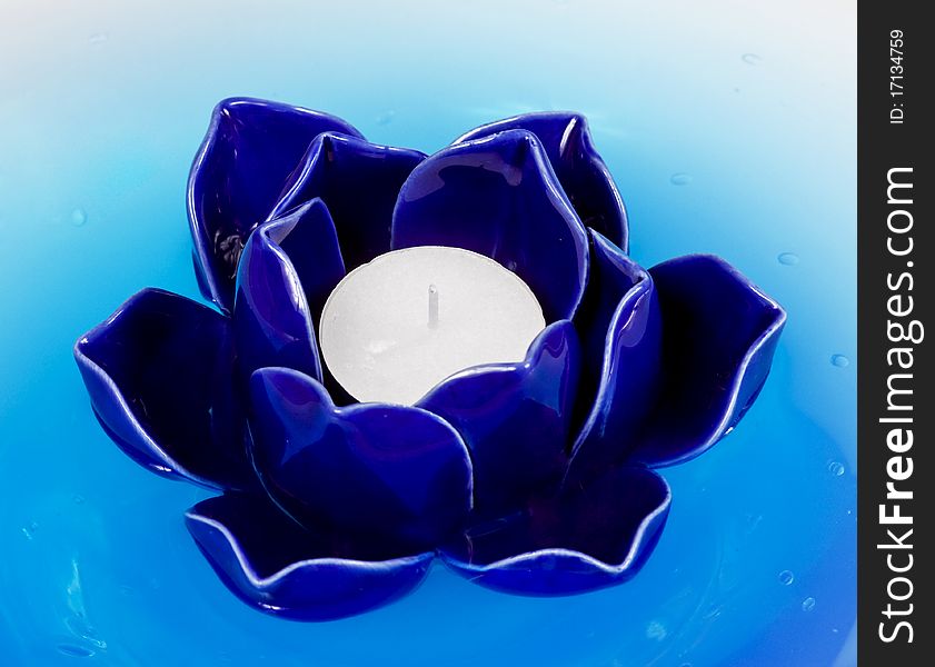 Ceramic candlestick on flower form