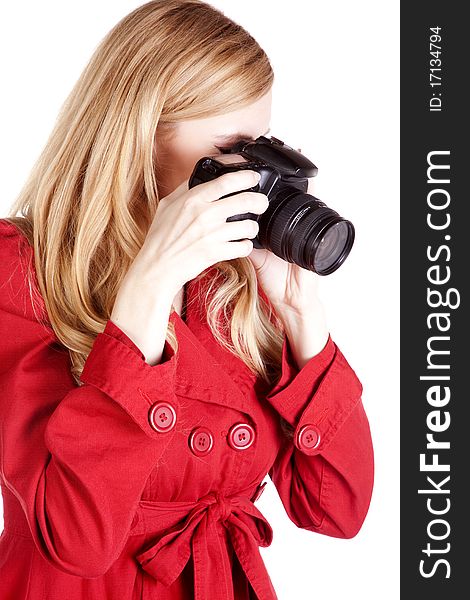 A woman concentrating on taking the perfect picture. A woman concentrating on taking the perfect picture.