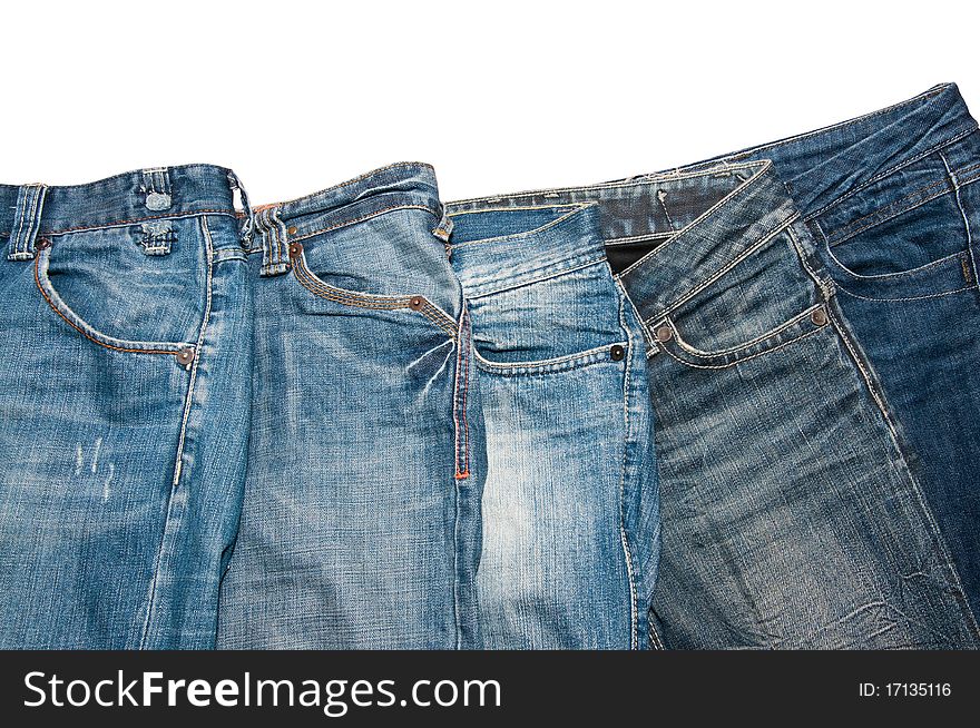 Some jeans with pockets on a white background