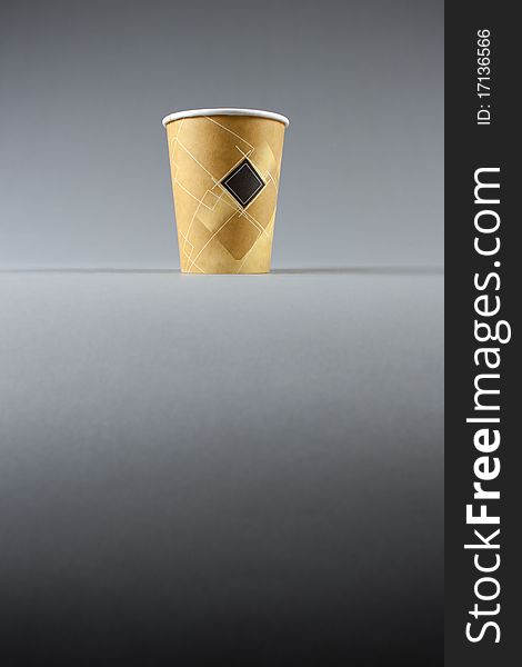 Yellow Paper Cup On Grey