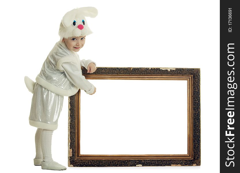 The boy in a suit of a hare has control over a frame from a picture