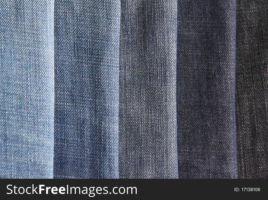 Texture of blue jeans as a background